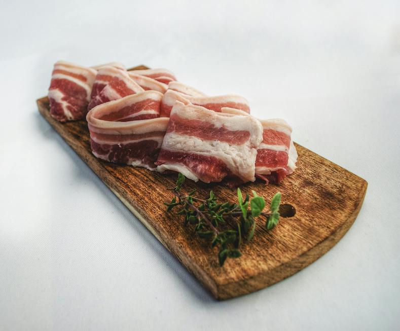 Raw bacon before cooking.