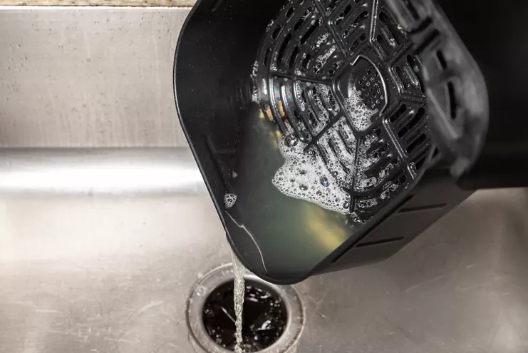 How to clean an air fryer step three.